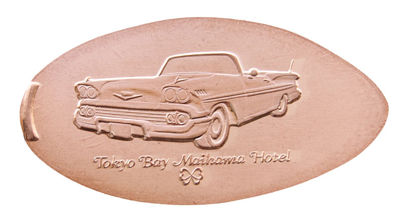 1958 Chevrolet convertible Maikama Hotel pressed souvenir.