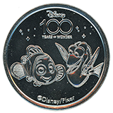 Disneyland Resort's Disney 100 Years of Wonder Souvenir Medallion featuring  Nemo and Dory.