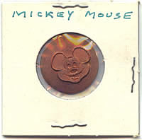 Pressed Mickey Mouse cent, early.