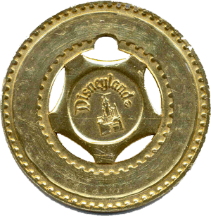 Metal typer token or sovenir from Disneyland gold