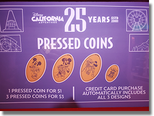 New 25th Anniversary pressed "coins" at DCA's Big Top Toys. 2-6-2026