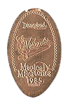 DL0321 RETIRED Videopolis opens 1985 Magical Milestones pressed penny elongated coin image.