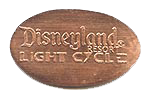 DL0501r DISNEYLAND ® RESORT, LIGHT CYCLE pressed penny stampback.