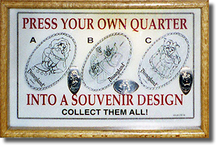 Gargoyles, Esmeralda and Quasimodo Disneyland pressed quarter machine marqee. DL0089-90-91. Image courtesy of the Wooten Family