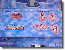 Disneyland Hotel hand crank pressed pennies featuring Capt. Hook, Crocodile, Peter Pan and Tinker Bell. Image courtesy of the Wooten Family.