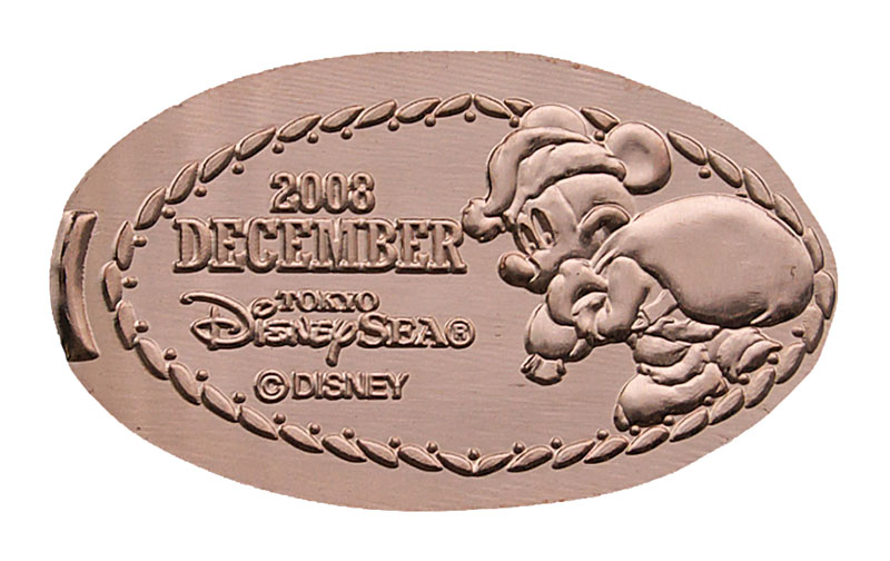 Mickey ready for Christmas! December Tokyo Disneyland medal or pressed penny.