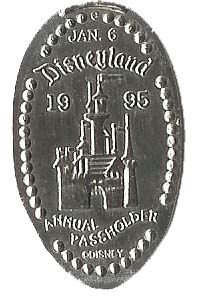 Give away elonaged coin from the Disneyalnd Annual Passholder Event in 1995