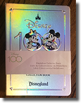Disney 100 Years of Wonder Souvenir Medallion collection book with label band.