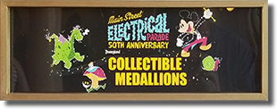 Machine #2, Main Street Electrical Parade Theme: Medallion #6 MSEP FireFly, Medallion #7 MSEP Pete's Dragon Elliott, Medallion #8, MSEP 50th Main Street Electrical Parade, Medallion #9 MSEP Mr. Snail. 
