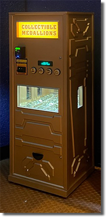 Tomorrowland attractions themed medallion vending machine #3 offering medallion guide numbers 10, 11, 12, 13 image taken the first day onstage, 10/13/2022. Disneyland medallion machine  #3 marquee, DLR Medallion #10 Tomorrowland Autopia,  DLR Medallion #11 Tomorrowland Monorail,  DLR Medallion #12 Tomorrowland Star Tours, DLR Medallion #13 Tomorrowland Space Mountain.