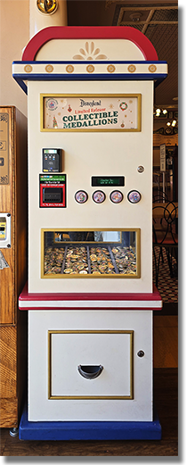 Machine Image:  Main Street Penny Arcade / Candy Palace - Main Street, Disneyland Park, USA. Button 1: #247 Colorized metallic silver medallion, 70th Logo, Santa Mickey Mouse with stars in the design field, red ring at the medallion rim. Button 2: #248 Colorized metallic silver medallion, 70th Logo, Santa Minnie Mouse with stars in the design field and a red ring at the medallion rim. Button 3: #249 Colorized metallic silver medallion, 70th Logo, Santa Winnie The Pooh with stars in the design field, a copyright notice across the bottom of the image and a red ring at the medallion rim. Button 4: #250 Colorized metallic silver medallion, 70th Logo, Stitch with stars in the design field and a red ring at the medallion rim. Onstage November 4, 2025. 