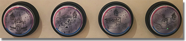 Buttons: Disneyland Story exit: Button 1: #267   "TO ALL WHO COME TO THIS HAPPY PLACE WELCOME" Disneyland 70th Anniversary Medallion.  Button 2: #268 Main Street Trolley Disneyland Resort 70th Anniversary medallion.  Button 3: #269 Main Street Jitney Disneyland Resort 70th Anniversary medallion. Button 4: #270 Mr. Toad's Wild Ride Disneyland Resort 70th Anniversary medallion. January 8, 2026. 