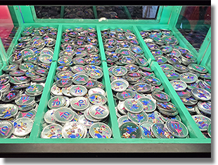 Window: Gone Hollywood Gifts  Button 1: #275 Excited Goofy Colorized Disneyland Resort 70th Anniversary medallion. Button 2: #276 Smitten Clarabelle Cow Colorized Disneyland Resort 70th Anniversary medallion.  Button 3: #277  Happy Running Dale Colorized Disneyland Resort 70th Anniversary medallion.   Button 4: #278  Happy Running Chip Colorized Disneyland Resort 70th Anniversary medallion. Onstage January 8, 2026.