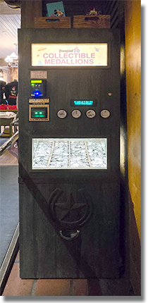 Pioneer Mercantile Medallion Machine:  Button 1: #271 Fantasyland's King Arthur Carousel Disneyland Resort 70th Anniversary medallion. Button 2: #272 Dumbo / Jumbo Disneyland Resort 70th Anniversary medallion. Button 3: #273 Peter Pan's Flight Attraction Disneyland Resort 70th Anniversary medallion. Button 4: #274 Monstro the whale at Storybook Land Canal Boats Disneyland Resort 70th Anniversary medallion. This machine was originally located at Pioneer Mercantile in Adventureland, Disneyland Park, USA onstage by January 8, 2026. 