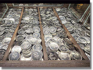 Pioneer Mercantile Machine Window:  Button 1: #271 Fantasyland's King Arthur Carousel Disneyland Resort 70th Anniversary medallion. Button 2: #272 Dumbo / Jumbo Disneyland Resort 70th Anniversary medallion. Button 3: #273 Peter Pan's Flight Attraction Disneyland Resort 70th Anniversary medallion. Button 4: #274 Monstro the whale at Storybook Land Canal Boats Disneyland Resort 70th Anniversary medallion. This machine was originally located at Pioneer Mercantile in Adventureland, Disneyland Park, USA onstage by January 8, 2026.  