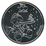 #51, Disneyland Resort's Disney 100 Years of Wonder Souvenir Medallion featuring Pinocchio. 