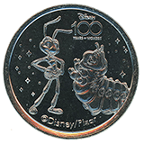 #71 Medallion, Disney 100 Years of Wonder Souvenir Medallion featuring Flik and Heimlich. Part of machine set #70-73.