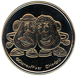 #109 Disneyland Resort Souvenir Medallion featuring Mr. and Mrs. Potatohead.