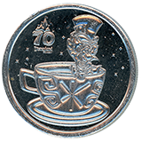 #259 Space Mountain Exit - Near Star Trader, Tomorrowland. Design: The Mad Hatter enjoying a ride in a tea cup, with stars in the sky above, Disneyland Resort 70th Anniversary medallion, Disneyland Resort 70th Anniversary medallion. December 25, 2025. 