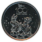 #19, Disneyland Resort's Disney 100 Years of Wonder Souvenir Medallion featuring Donald and Daisy Duck.