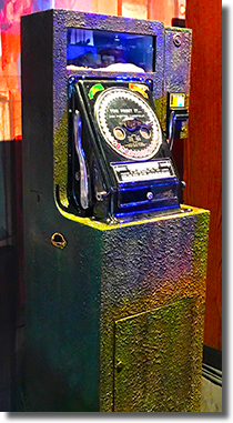 A Piece of Eight Doubloon Stamper Machine at the 2017 D23 Expo. Machine was not accessable or opperative.