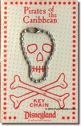 Pirates of the Caribbean key chain white cared with red print