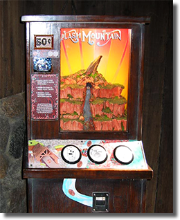 For the new March of 2005 DL0277-279 pressed coin set (and other coins to follow), Disneyland awed guests with this new three play coin press machine. Themed and built by Disneyland Cast Members.