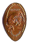 DL0072 Retired Eeyore pressed penny or elongated coin image.