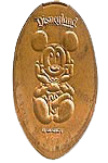 DL0347 Mickey sitting, legs crossed pressed penny elongated coin image.