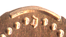 D for Disneyland near coin grip