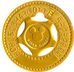 Disneyland Medal Typer Token, "Bob & Charlotte 5-2-2000" gold color.