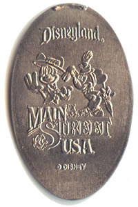 DL0251 The first Disney elongated coin with a backstamp First Version of  Main Street USA. Small Grip.