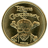  #1-4 reverse, Medallion Vending Machine Bright Brass Medallion Reverse "Pirates of the Caribbean" with skull and cross bones.