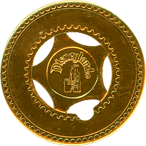 Gold Disneyland typer stamper token, 1986 variation obverse